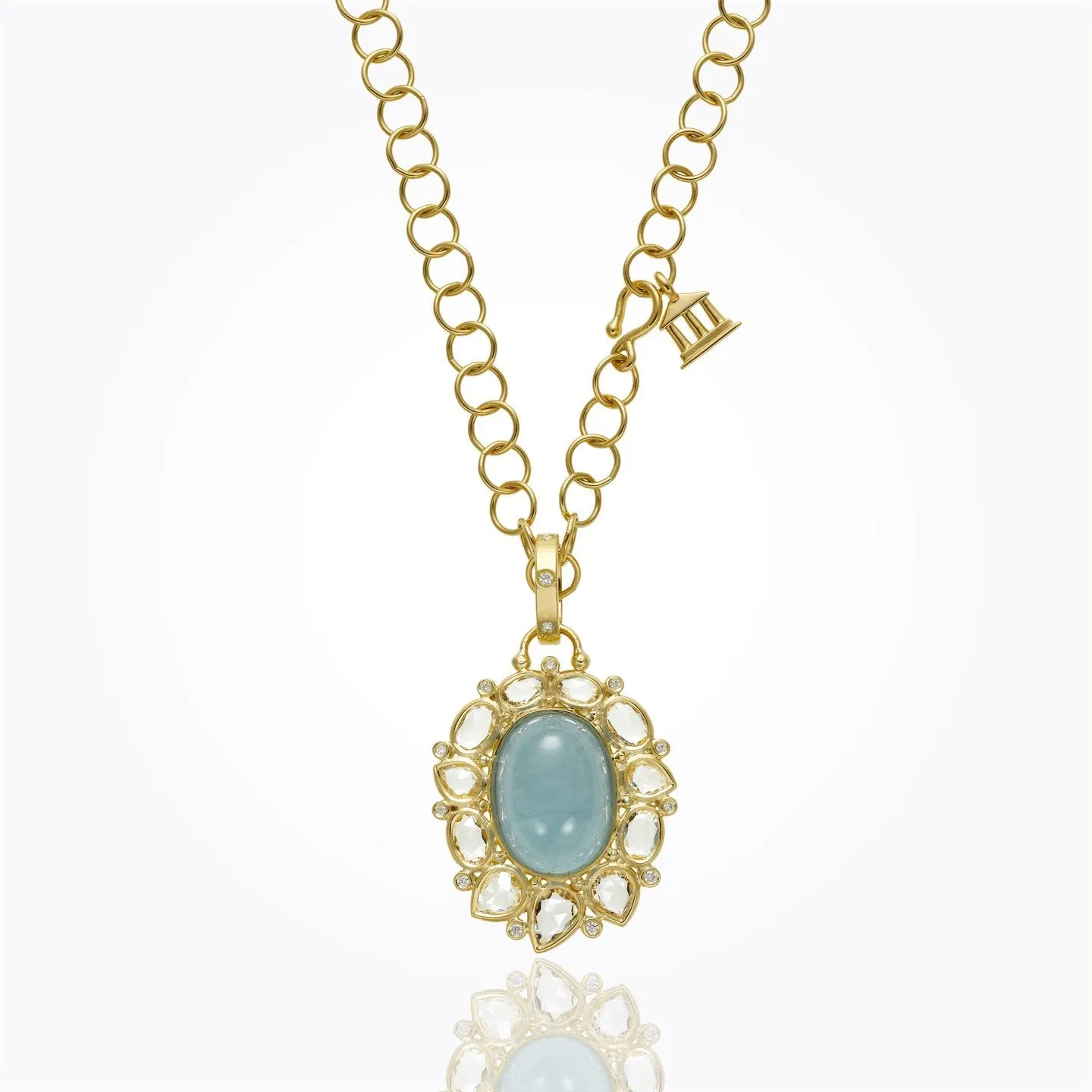 18K Artemis Pendant with cabochon aquamarine, faceted white sapphire, and diamond