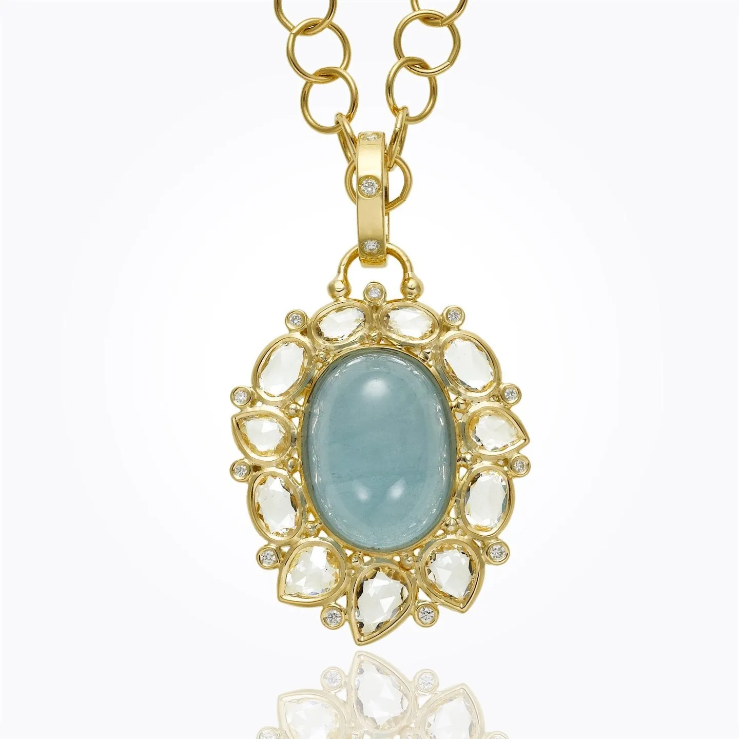 18K Artemis Pendant with cabochon aquamarine, faceted white sapphire, and diamond