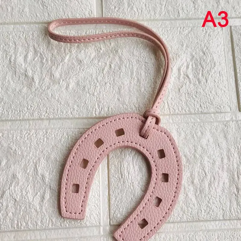 Horseshoe, Keychain for a bag. Women's fashion keychain. handmade. Bag pendant. Fashion keychain for bag. horseshoe keychain.