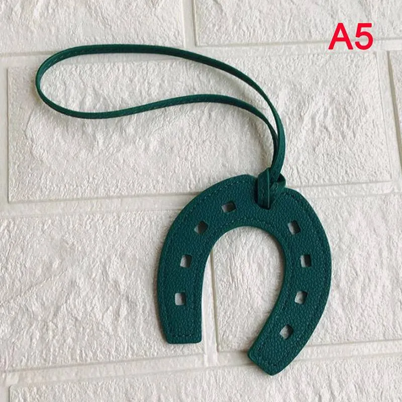 Horseshoe, Keychain for a bag. Women's fashion keychain. handmade. Bag pendant. Fashion keychain for bag. horseshoe keychain.