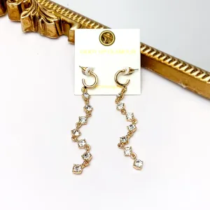 Red Carpet Moment Long Gold Tone Earrings With Clear Crystals